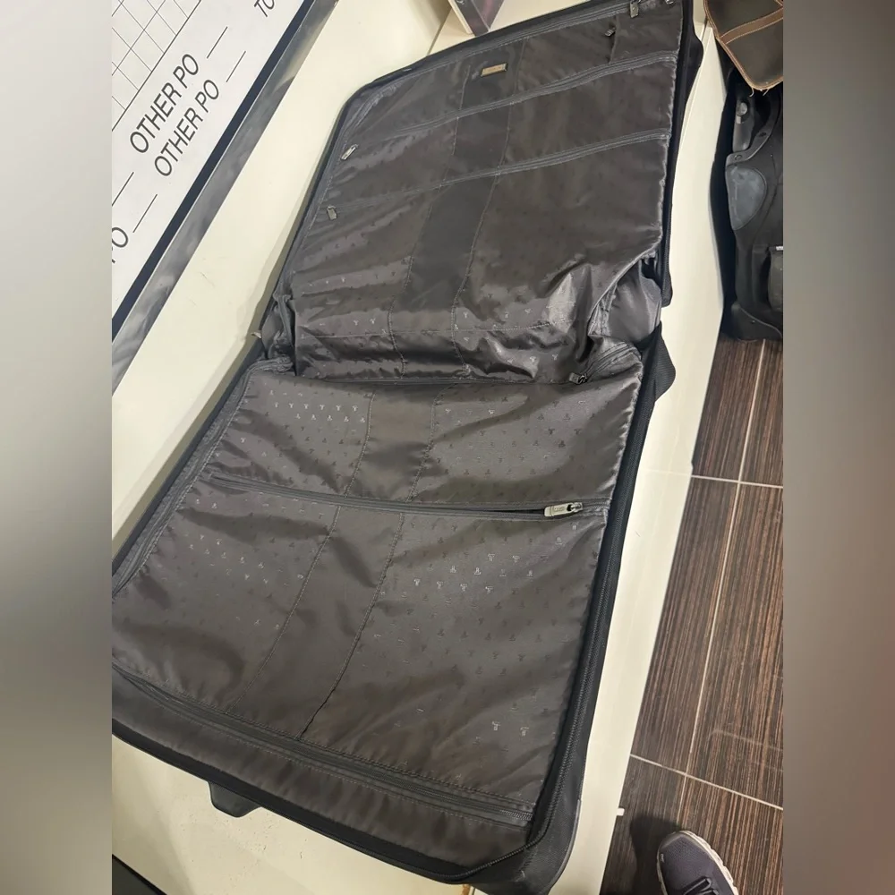 Tumi Black Rolling Garment Bag with Front Organizer Pockets
